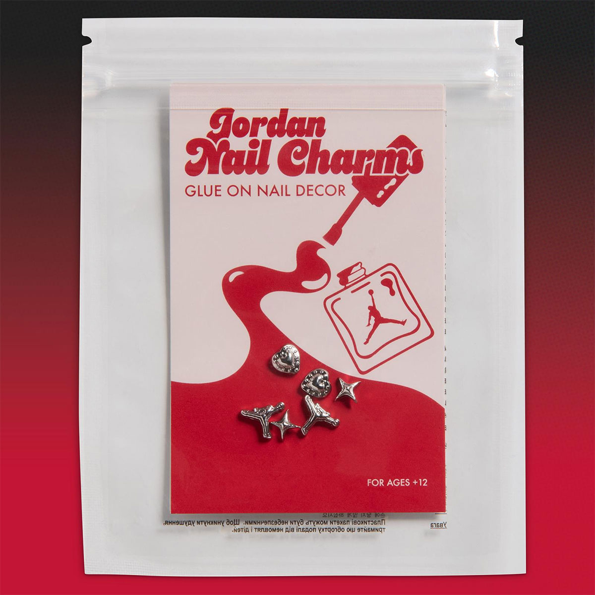 Carte Jordan Nail Charms avec cinq bijoux à ongles : cœurs, Jumpman et étoiles à quatre branches